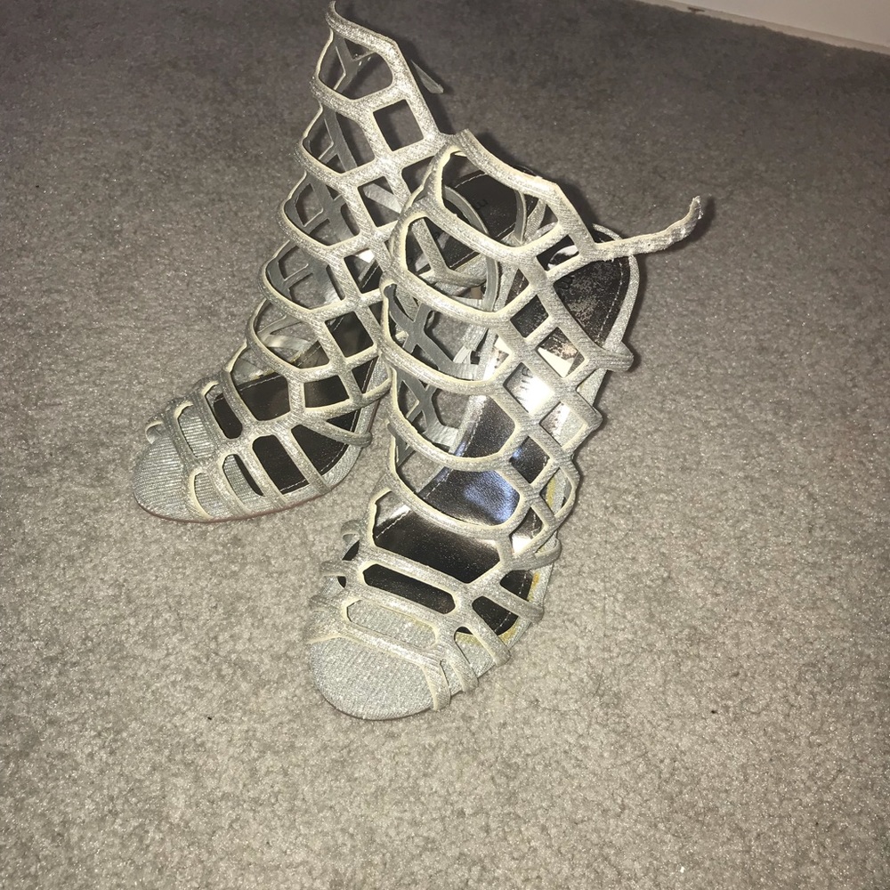 Silver high heels , size 6